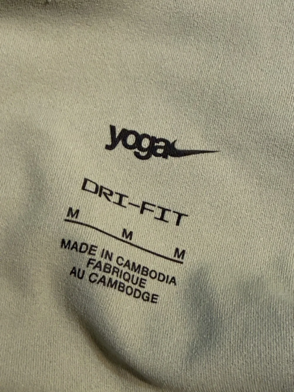 Nike Dri-FIT Yoga leggings in Olive M